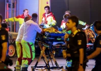 emergency responders assist a person at the site after the annual berlin s christopher street day pride parade was called off after a car crashed into the crowd at tiergarten park leaving several people injured in berlin germany july 25 2026 photo reuters