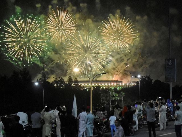 People watch fireworks exploding during the celebration of Independence Day in Islamabad on August 14, 2025. Photo: Reuters