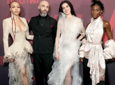 anne hathaway embraces sheer couture trend on mother mary press tour anne hathaway embraces sheer couture trend on mother mary press tour