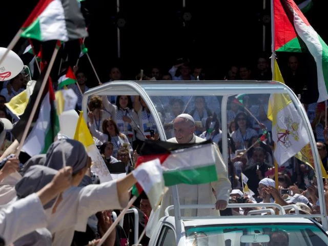 pope francis arrives to celebrate mass in manger square next to the church of the nativity believed by many to be the birthplace of jesus christ in the west bank city of bethlehem may 25 2014 photo reuters pope francis arrives to celebrate mass in manger square next to the church of the nativity believed by many to be the birthplace of jesus christ in the west bank city of bethlehem may 25 2014 photo reuters