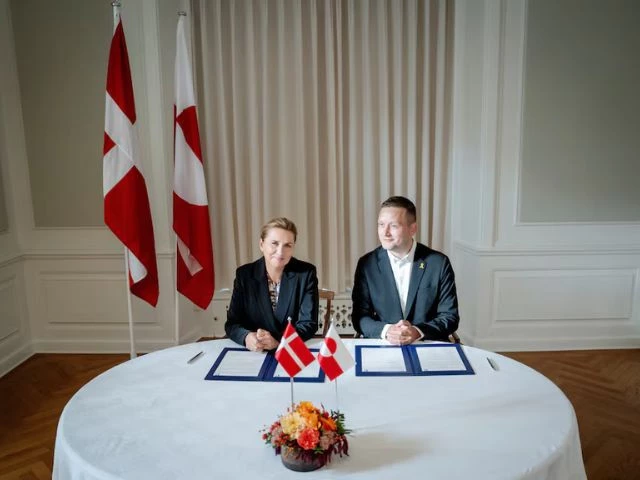 denmark s prime minister mette frederiksen and greenland s prime minister jens frederik nielsen sign a framework agreement for a self sustaining greenland at the prime minister s office in copenhagen denmark via reuters
