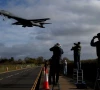 people use their cameras as a usaf b 1 bomber approaches to land at raf fairford airbase used by united states air force usaf personnel amid the us israeli war on iran photo reuters
