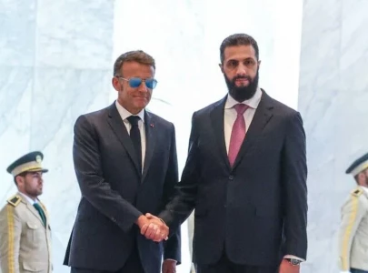macron says syria visit continues despite damascus explosions