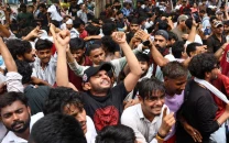 modi s education minister resigns in win for indian youth protesters