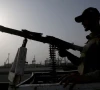 a paramilitary trooper mans a gun atop a vehicle as he keeps guard during a media tour of the karachi port pakistan may 9 2025 photo reuters