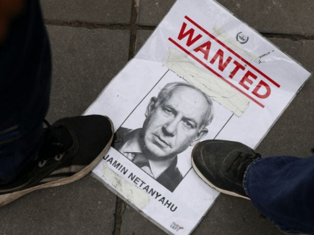 People step on a piece of paper with the image of Israeli Prime Minister Benjamin Netanyahu, during a protest in support of Palestinians, calling for an immediate ceasefire in Gaza, amid the ongoing conflict between Israel and Hamas, in Paris, France on July 31, 2025. Photo: Reuters