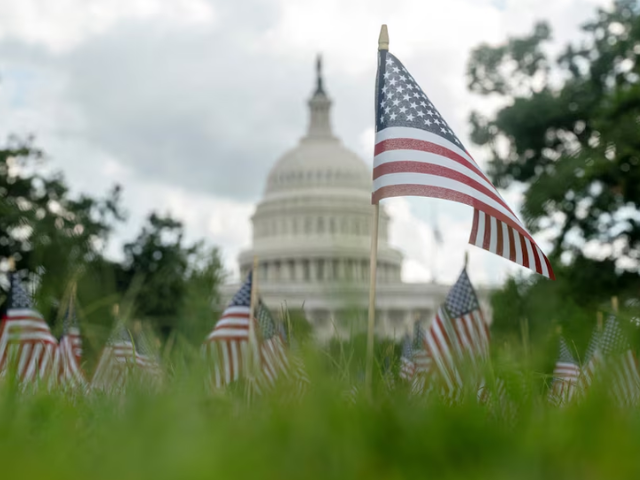 A single flag is planted in memory of Charlie Kirk, according of organizers at the Young America's Foundation, alongside a field of flags marking the anniversary of the 9/11 terrorist attacks outside of US Capitol after Charlie Kirk was shot dead in Utah, in Washington, DC, September 11. Photo: Reuters