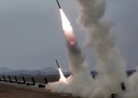 a test launch of 600 mm calibre multiple rocket launchers is overseen by north korean leader kim jong un not pictured north korea march 14 2026 in this picture released by north korea s official korean central news agency photo reuters