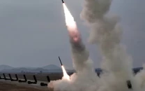 north korea fires ballistic missiles again flexing muscle amid us iran war