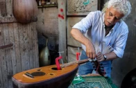 photo palestinian craftsman suhail abu shawish repairing damaged ouds afp