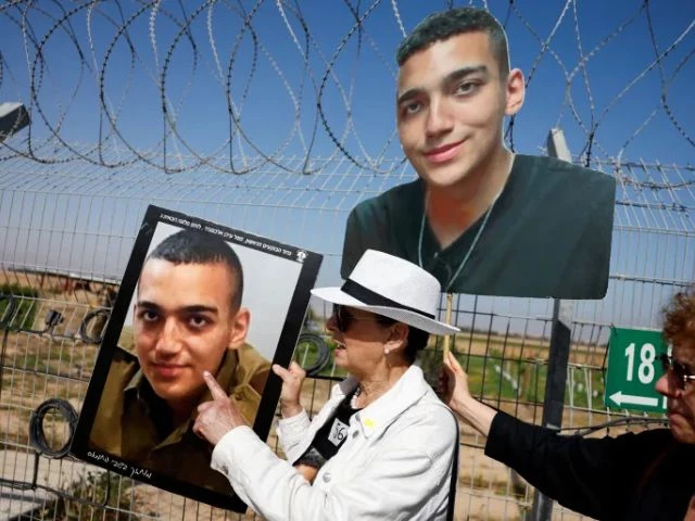 varda ben baruch grandmother of us israeli citizen edan alexander points at a portrait of the captive photoi reuters varda ben baruch grandmother of us israeli citizen edan alexander points at a portrait of the captive photoi reuters