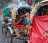 rickshaw drivers sit inside of their rickshaws to take cover during torrential rain in dhaka bangladesh july 7 2026 photo reuters