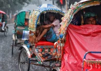 rickshaw drivers sit inside of their rickshaws to take cover during torrential rain in dhaka bangladesh july 7 2026 photo reuters