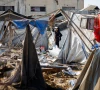 a woman stands near destroyed tents sheltering already displaced palestinians following an overnight israeli strike on a medicine warehouse according to medics in deir al balah in the central gaza strip august 1 2026 photo reuters