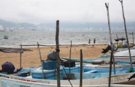 fishing boats rest on the sand after being pulled from the sea as hurricane trudy moves parallel to mexico s pacific coast threatening more rain and strong winds after recent deadly storms in acapulco mexico october 15 2026 photo reuters