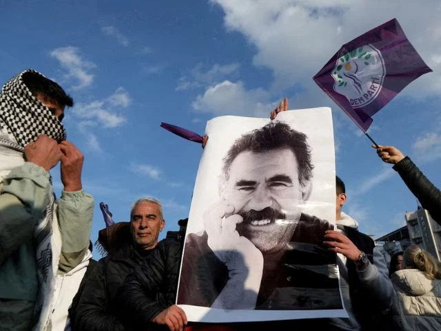 a demonstrator holds a picture of jailed kurdish militant leader abdullah ocalan during a rally in diyarbakir turkey february 27 2025 photo reuters a demonstrator holds a picture of jailed kurdish militant leader abdullah ocalan during a rally in diyarbakir turkey february 27 2025 photo reuters