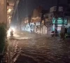 a motorcyclist rides through a flooded road during overnight rain in rawalpindi photo express