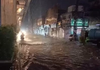 a motorcyclist rides through a flooded road during overnight rain in rawalpindi photo express
