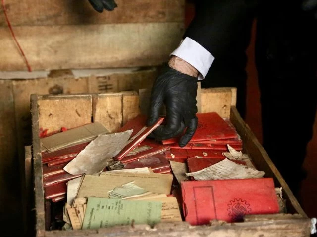 a person holds nazi related material that was originally confiscated by local authorities when it was shipped to argentina in 1941 after several boxes containing the material were recently discovered by chance in the archives of the supreme court of argentina in buenos aires photo reuter a person holds nazi related material that was originally confiscated by local authorities when it was shipped to argentina in 1941 after several boxes containing the material were recently discovered by chance in the archives of the supreme court of argentina in buenos aires photo reuter
