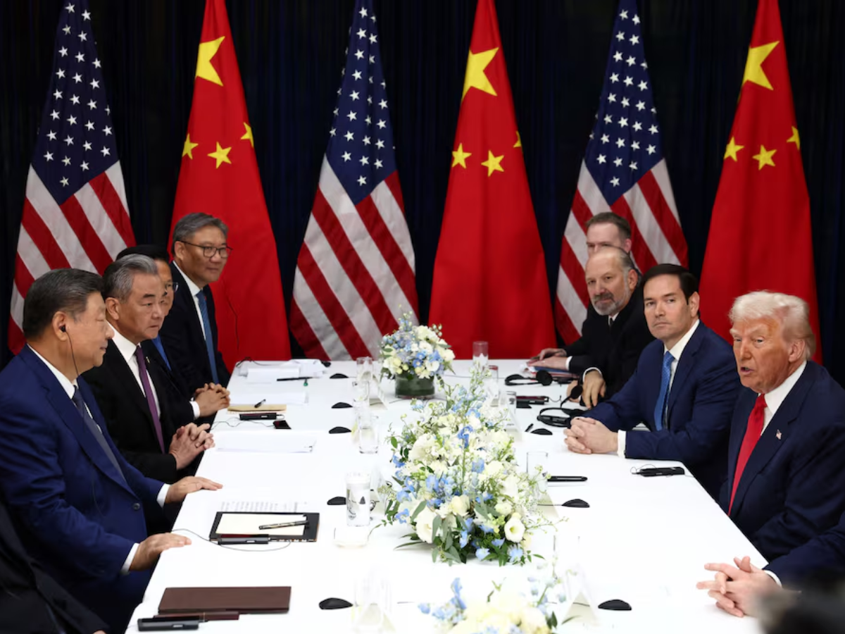 US President Donald Trump, accompanied by US Secretary of State Marco Rubio and US Secretary of Commerce Howard Lutnick, attends a bilateral meeting with Chinese President Xi Jinping, accompanied by Chinese Foreign Minister Wang Yi, at Gimhae International Airport, on the sidelines of the Asia-Pacific Economic Cooperation (APEC) summit, in Busan, South Korea, October 30, 2025 Photo: Reuters