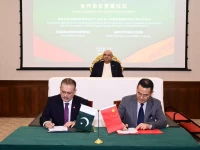 a signing ceremony was held in sanaya where institutions from pakistan and china signed two memoranda of understanding and an agreement photo ppp