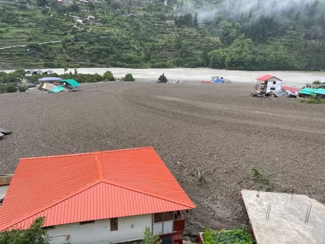 Houses are partially buried by a mudslide, amid flash floods, in Dharali, Uttarakhand, India, August 5, 2025. Photo: Reuters
