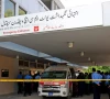 police officers move past an ambulance outside an intensive care unit after a fire broke out at the pakistan institute of medical sciences pims hospital in islamabad pakistan photo reuters