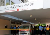 police officers move past an ambulance outside an intensive care unit after a fire broke out at the pakistan institute of medical sciences pims hospital in islamabad pakistan photo reuters