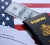 us flag mock passport and dollar banknote and h 1b visa application form are seen in this illustration taken september 26 2025 photo reuters