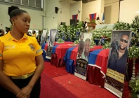 a member of the police attends the funeral of four haitian police officers two of whom were killed when an explosive drone accidentally detonated at a swat base in august on the outskirts of port au prince in kenscoff haiti september 6 2025 photo reuters