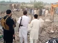 rescue and search operations continue after terrorists rammed an explosives laden vehicle into the fateh khel police checkpoint in khyber pakhtunkhwa s bannu district late saturday night martyring 12 police personnel photo express