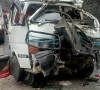 the wreckage of a passenger van after it collided with a dumper on the swat motorway in lower dir killing four people photo express
