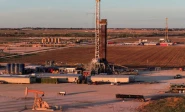 a drone view of drilling rigs in midland texas u s june 11 2025 photo reuters