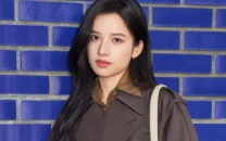 zhang jingyi sparks buzz with trash bag purse at beijing international film festival