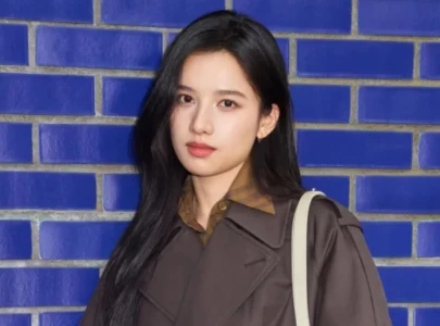 zhang jingyi sparks buzz with trash bag purse at beijing international film festival