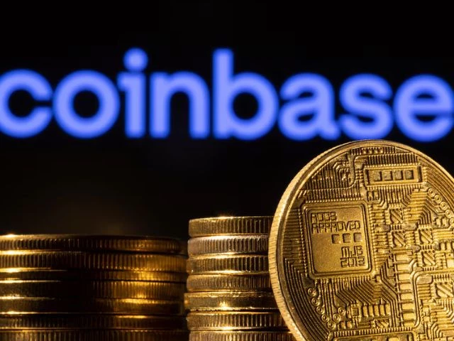 representation of the cryptocurrency is seen in front of coinbase logo in this illustration taken march 4 2022 photo reuters representation of the cryptocurrency is seen in front of coinbase logo in this illustration taken march 4 2022 photo reuters