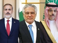 pictured above is turkish foreign minister hakan fidan l deputy prime minister and foreign minister ishaq dar c and saudi foriegn minister prince faisal bin farhan r