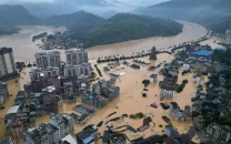 china expands compensation for flood hit communities