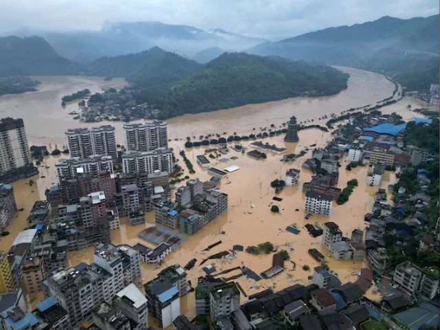 a drone view shows buildings and roads are half submerged in floodwaters after heavy rainfalls in rongjiang county guizhou province china june 24 2025 china daily via reuters file photo a drone view shows buildings and roads are half submerged in floodwaters after heavy rainfalls in rongjiang county guizhou province china june 24 2025 china daily via reuters file photo