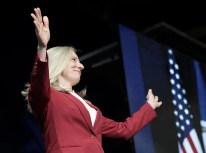 virginia s governor elect abigail spanberger pauses victory speech to assist fainting woman