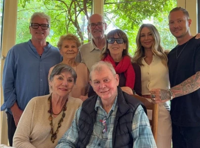 john farnham makes rare public appearance following cancer treatment