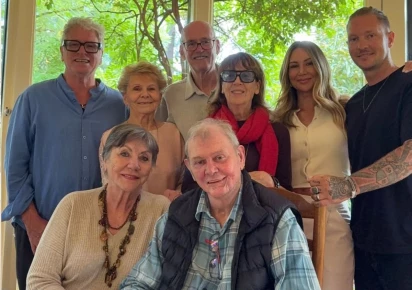 John Farnham makes rare public appearance following cancer treatment