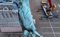 strong winds topple 24 meter statue of liberty replica in southern brazil strong winds topple 24 meter statue of liberty replica in southern brazil