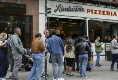 photo queueing outside l industrie pizza in manhattan afp