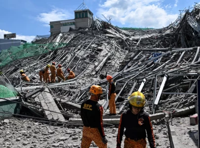 at least one dead in philippine building collapse 21 people missing at least one dead in philippine building collapse 21 people missing