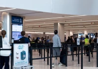 travellers walk at the charlotte douglas international airport in charlotte north carolina u s march 22 2026 photo reuters