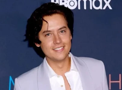 cole sprouse flips the script on secret fan photos