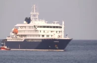 a boat beside cruise ship mv hondius anchored off cape verde port on the day sick passengers were evacuated by boat from the cruise ship in praia port cape verde in this screengrab obtained from a video may 5 2026 photo reuters