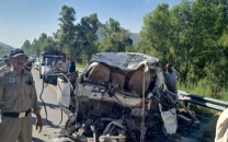 16 killed six injured after van crashes into parked bus on swat expressway