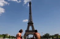 people cool off in the trocadero fountain next to the eiffel tower in paris as temperatures rise during a heatwave affecting a large part of france june 22 2026 photo reuters